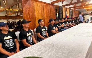 Former marines sit at a long table during a press conference in the Philippines where they alleged cash deliveries and called for a Senate review.